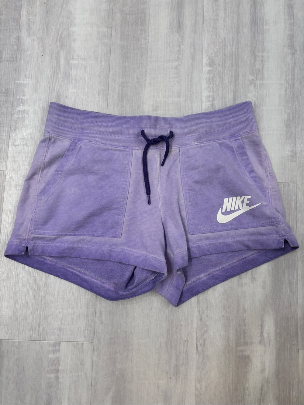 Nike Women's Lavender Athletic Shorts with White Logo Pockets Small